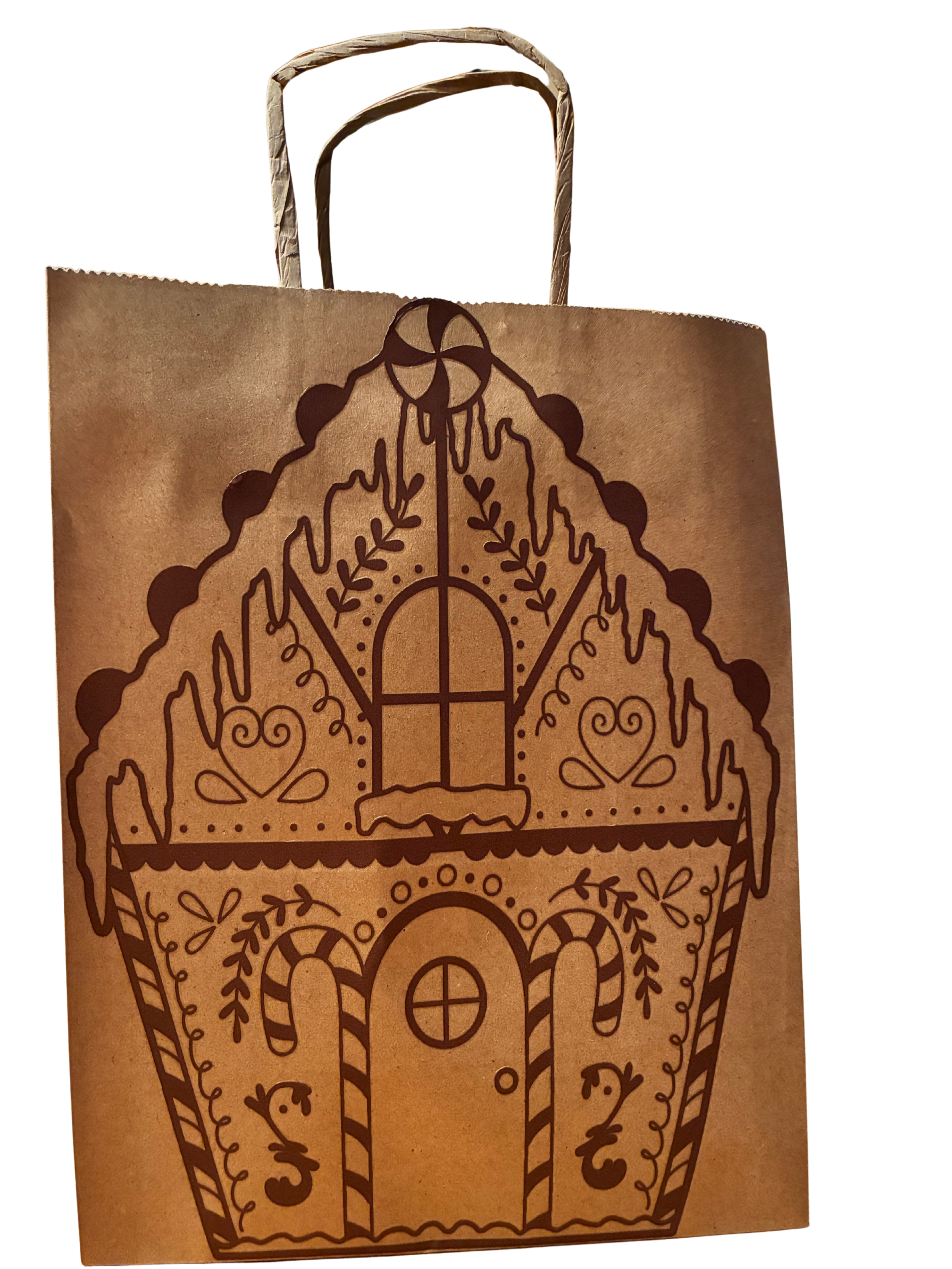 Brown paper bag with gingerbread house design on a white background