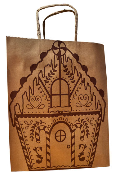 Brown paper bag with gingerbread house design on a white background