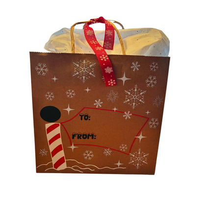 Gift bag with snowflake pattern and 'To' and 'From' labels on a white background